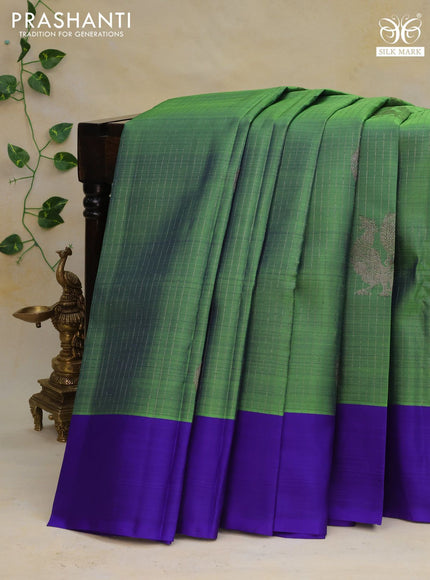 Pure kanchipuram silk saree green shade and blue with allover thread & silver zari weaves and simple border