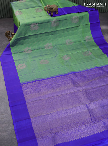 Pure kanchipuram silk saree green shade and blue with allover thread & silver zari weaves and simple border