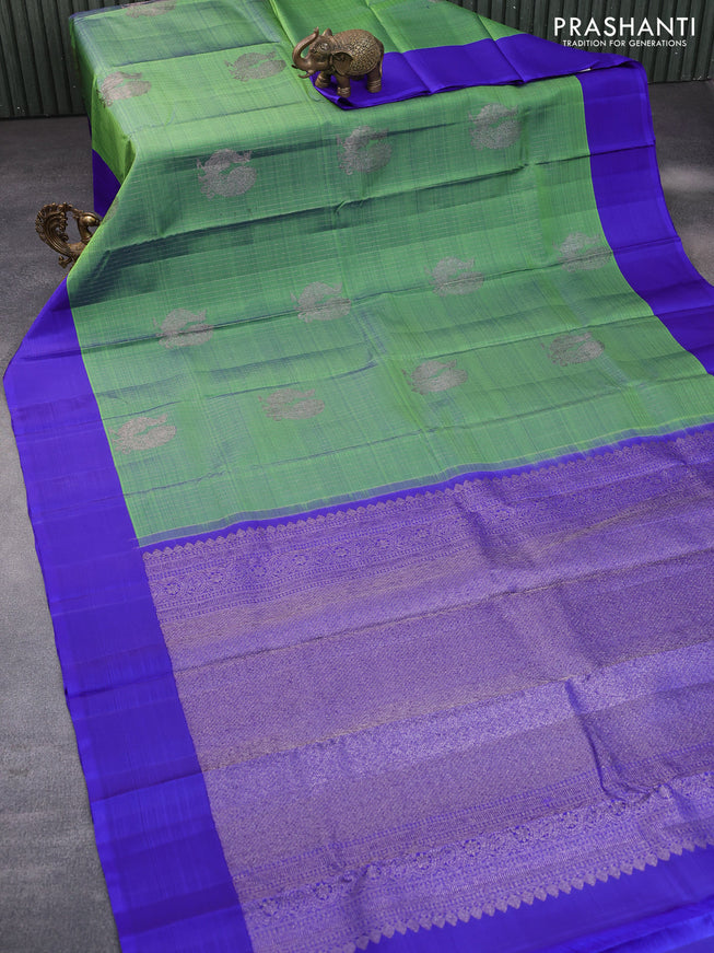 Pure kanchipuram silk saree green shade and blue with allover thread & silver zari weaves and simple border