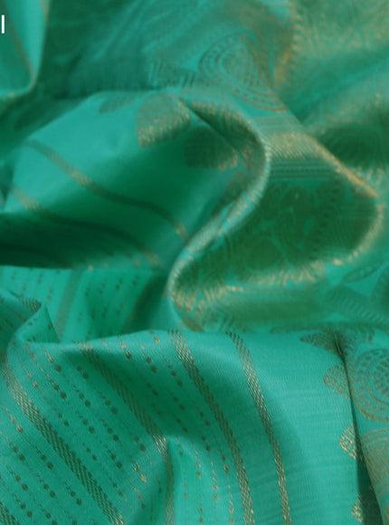 Pure kanchipuram silk saree teal green shade with allover zari weaves and zari woven border