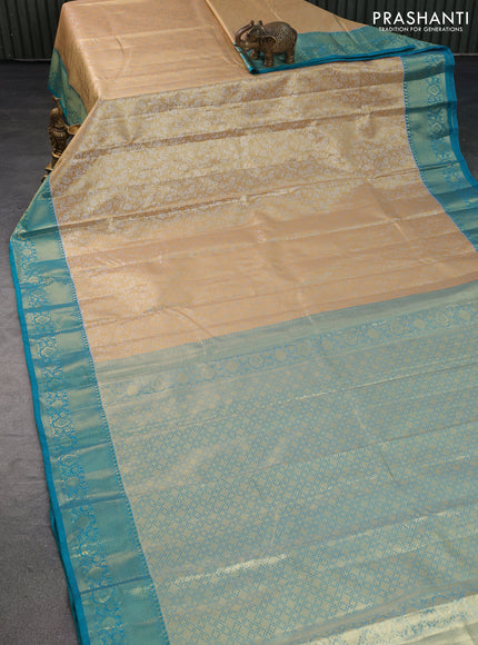 Bangalori tissue silk saree sandal and teal green shade with allover silver zari woven brocade weaves and zari woven border