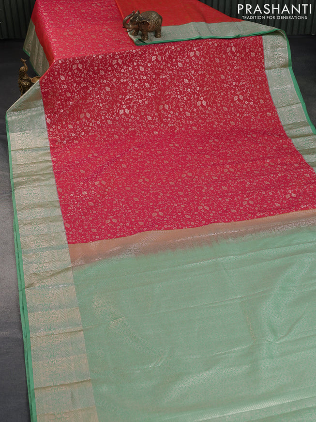 Bangalori silk saree dual shade of pinkish orange and pastel green with allover zari weaves and zari woven border