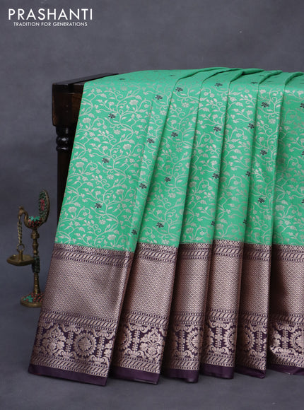 Bangalori silk saree teal green shade and deep violet with allover silver zari woven brocade weaves and long zari woven border