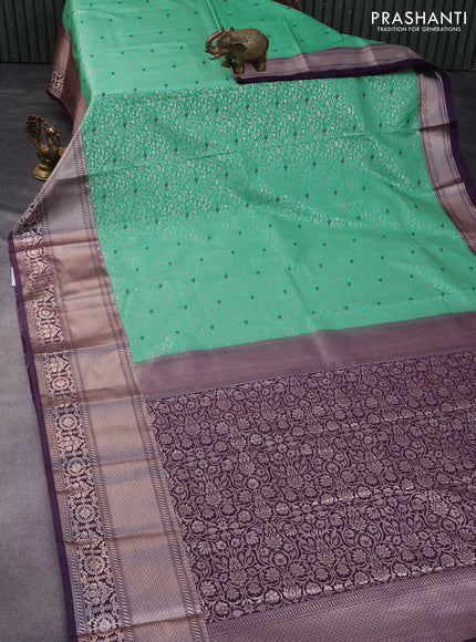 Bangalori silk saree teal green shade and deep violet with allover silver zari woven brocade weaves and long zari woven border