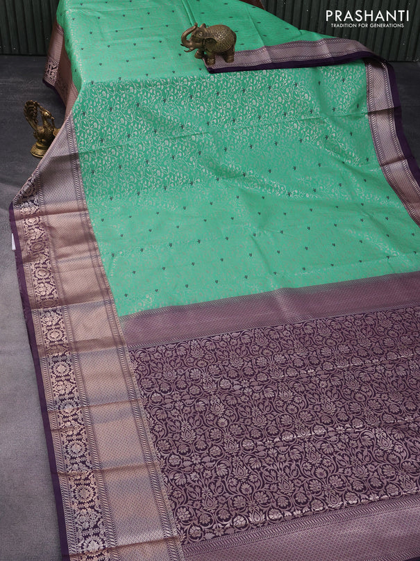 Bangalori silk saree teal green shade and deep violet with allover silver zari woven brocade weaves and long zari woven border