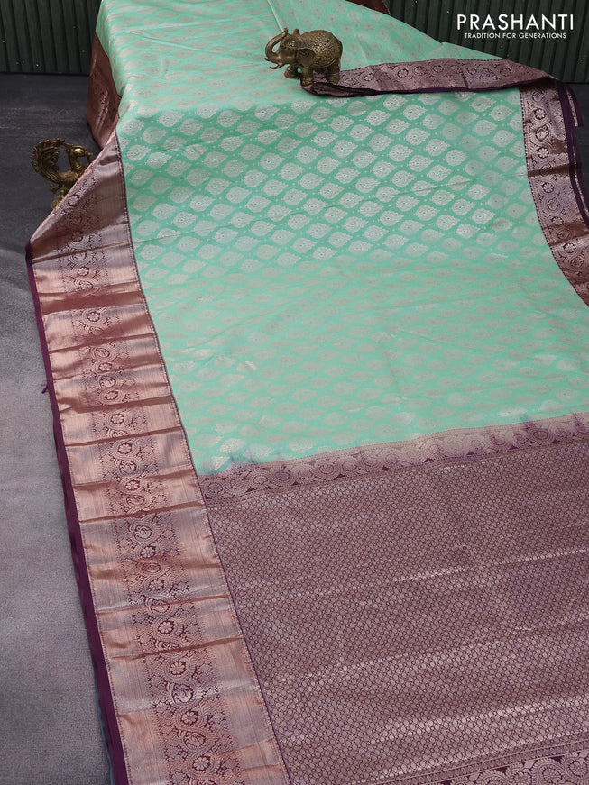 Bangalori silk saree teal shade and wine shade with allover zari woven brocade weaves and long zari woven border