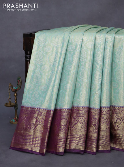 Bangalori tissue silk saree teal blue and violet with allover silver zari woven brocade weaves and long zari woven border