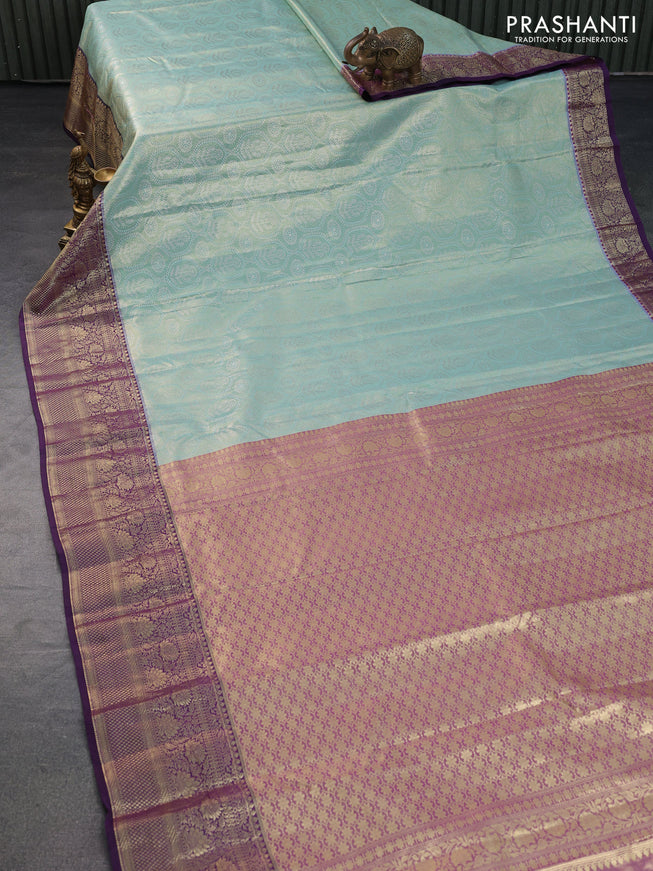 Bangalori tissue silk saree teal blue and violet with allover silver zari woven brocade weaves and long zari woven border