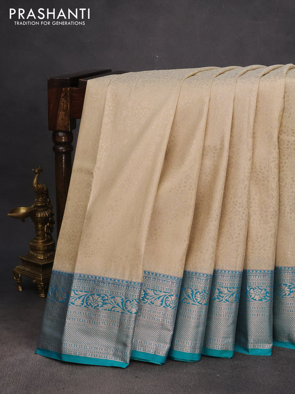 Bangalori silk saree cream and teal blue with allover zari woven brocade weaves and rich zari woven border