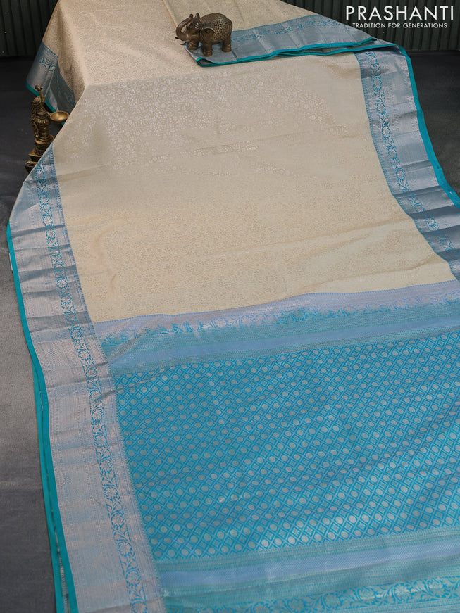 Bangalori silk saree cream and teal blue with allover zari woven brocade weaves and rich zari woven border