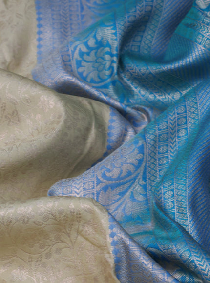 Bangalori silk saree cream and teal blue with allover zari woven brocade weaves and rich zari woven border