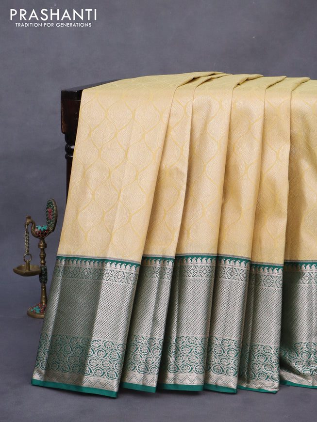 Bangalori silk saree cream and teal green with allover zari woven brocade weaves and long zari woven border