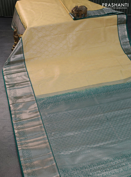 Bangalori silk saree cream and teal green with allover zari woven brocade weaves and long zari woven border