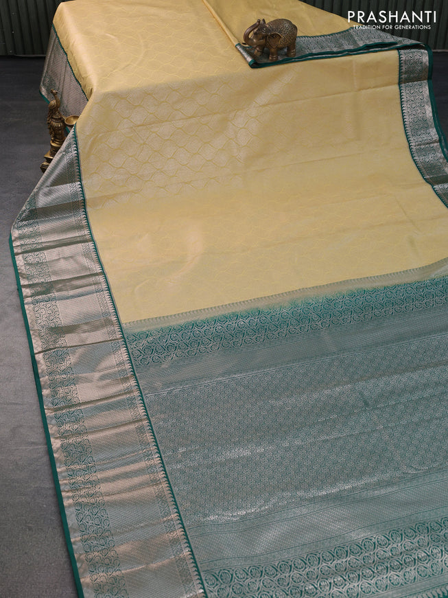 Bangalori silk saree cream and teal green with allover zari woven brocade weaves and long zari woven border