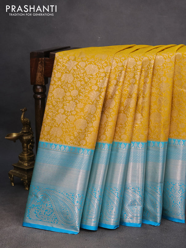 Bangalori silk saree mustard yellow and light blue with allover zari woven brocade weaves and long silver zari woven border