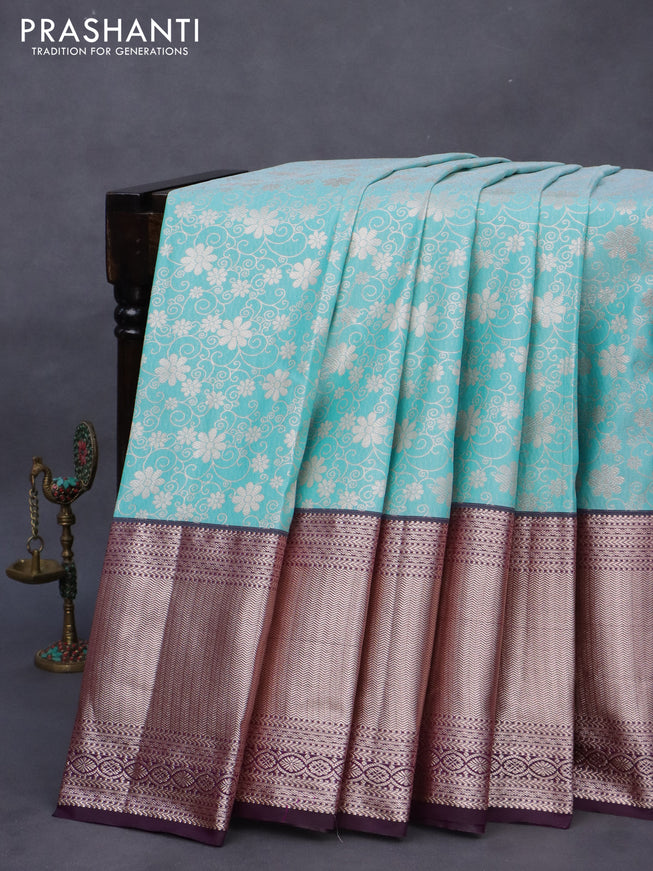 Bangalori silk saree teal blue shade and dark purple with allover zari woven brocade weaves and long zari woven border