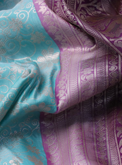 Bangalori silk saree teal blue shade and dark purple with allover zari woven brocade weaves and long zari woven border