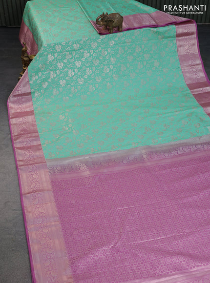 Bangalori silk saree teal green shade and mauve pink with allover zari woven brocade weaves and zari woven border