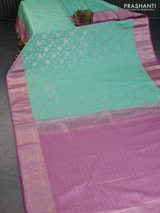 Bangalori silk saree teal green shade and mauve pink with allover zari woven brocade weaves and zari woven border