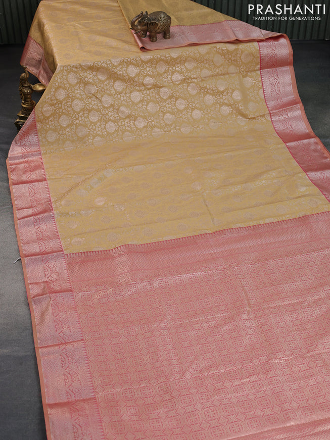 Bangalori silk saree sandal and dual shade of pastel peach with allover zari woven brocade weaves and zari woven border