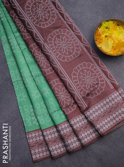 Sambalpuri semi silk saree green and brown with allover ikat weaves and thread woven border