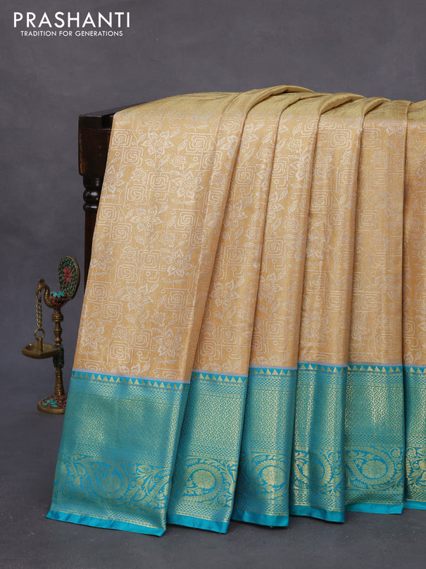 Bangalori tissue silk saree gold and teal blue with allover silver zari woven brocade pattern and long zari woven border