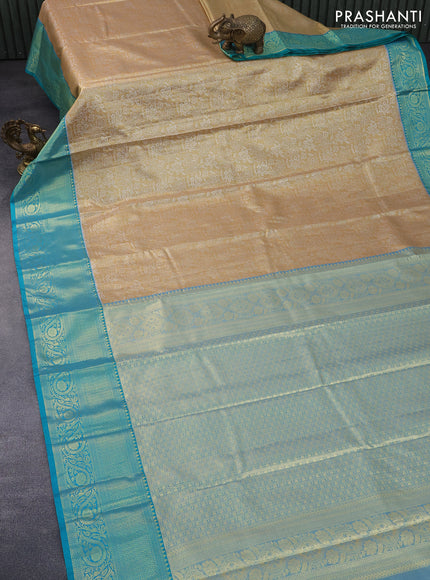 Bangalori tissue silk saree gold and teal blue with allover silver zari woven brocade pattern and long zari woven border