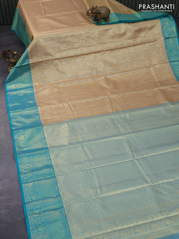 Bangalori tissue silk saree gold and teal blue with allover silver zari woven brocade pattern and long zari woven border