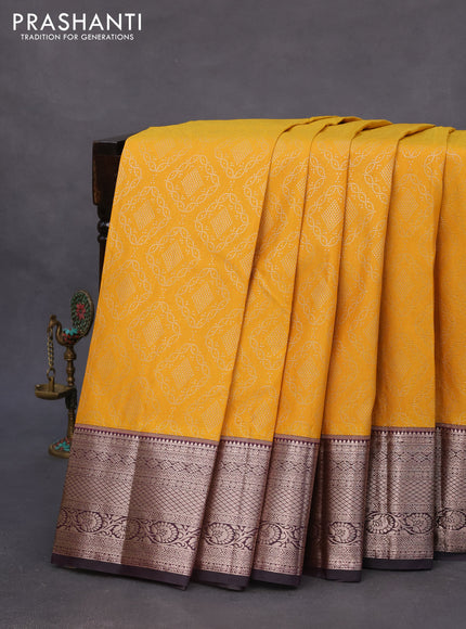 Bangalori silk saree yellow and jamun shade with allover zari woven brocade pattern and zari woven border