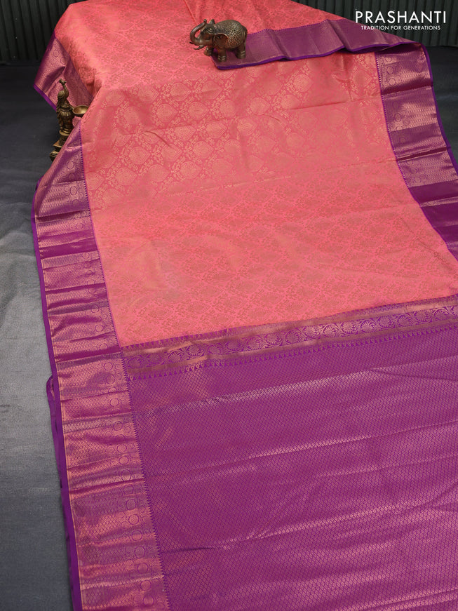 Bangalori silk saree peach shade and purple with allover copper zari woven brocade weaves and zari woven border