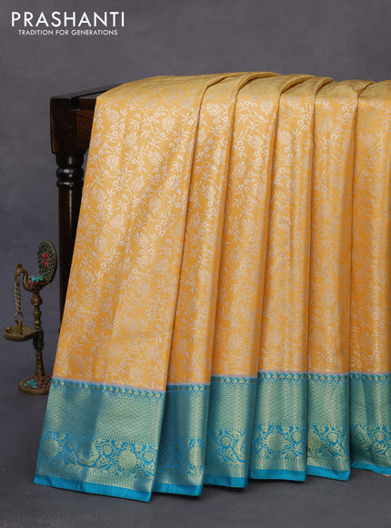 Bangalori tissue silk saree yellow and teal blue with allover silver zari woven brocade pattern and zari woven border