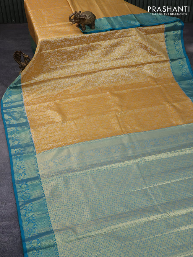 Bangalori tissue silk saree yellow and teal blue with allover silver zari woven brocade pattern and zari woven border