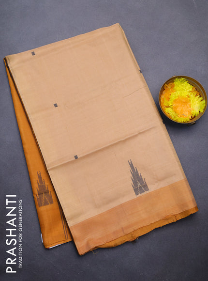 Banana pith saree sandal and mustard shade with thread woven buttas and contrast border