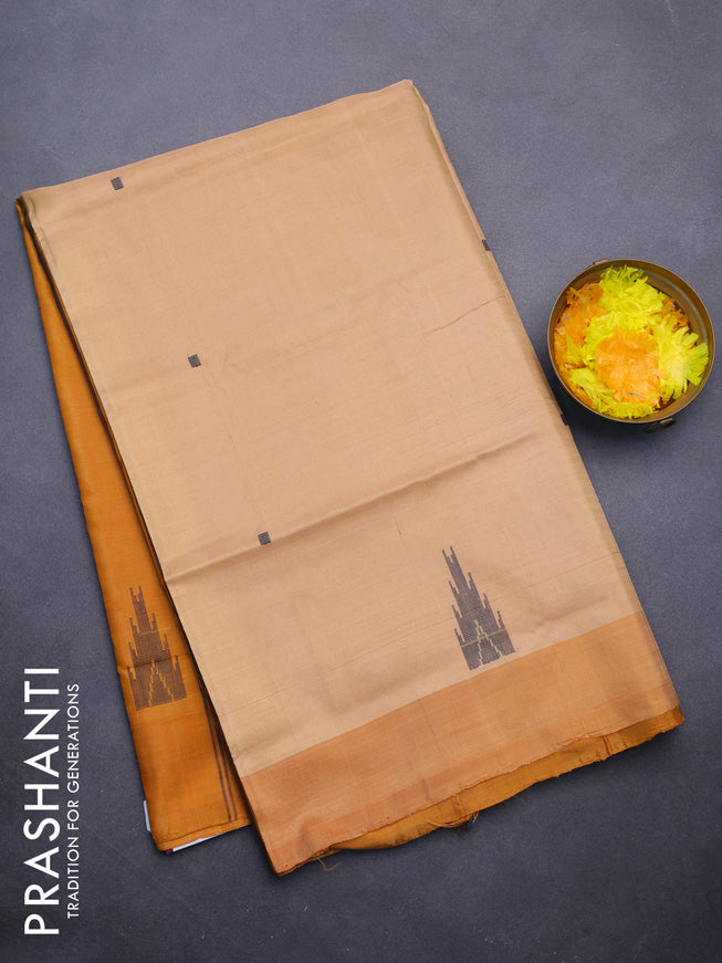 Banana pith saree sandal and mustard shade with thread woven buttas and contrast border