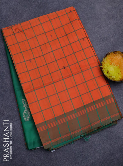 Banana pith saree orange and green with allover checks & buttas and contrast border