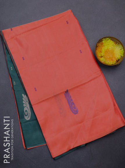 Banana pith saree peach shade and bottle green with thread woven buttas in borderless style