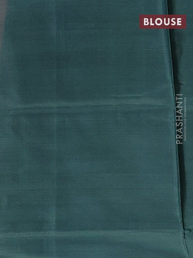 Banana pith saree peach shade and bottle green with thread woven buttas in borderless style