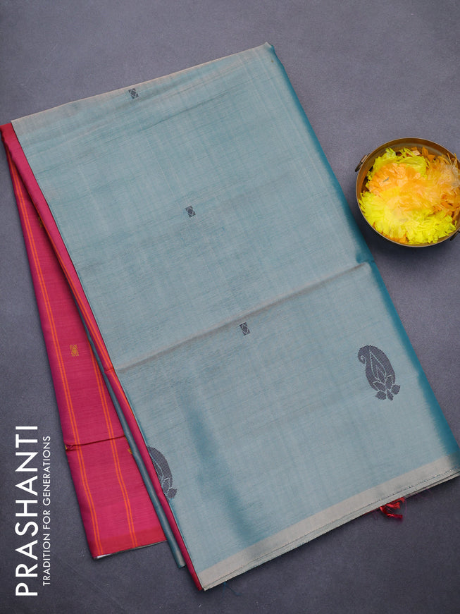 Banana pith saree dual shade of beigish green and reddish pink with thread woven buttas in borderless style