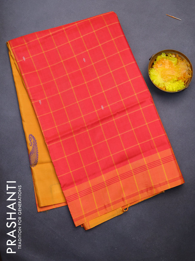 Banana pith saree pinkish orange and mango yellow with allover checked pattern and contrast border