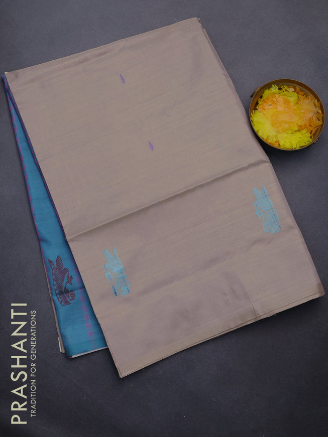 Banana pith saree beige and teal blue with thread woven buttas in borderless style