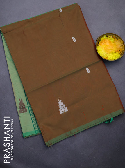 Banana pith saree dual shade of maroon and pastel green with thread woven buttas and piping border