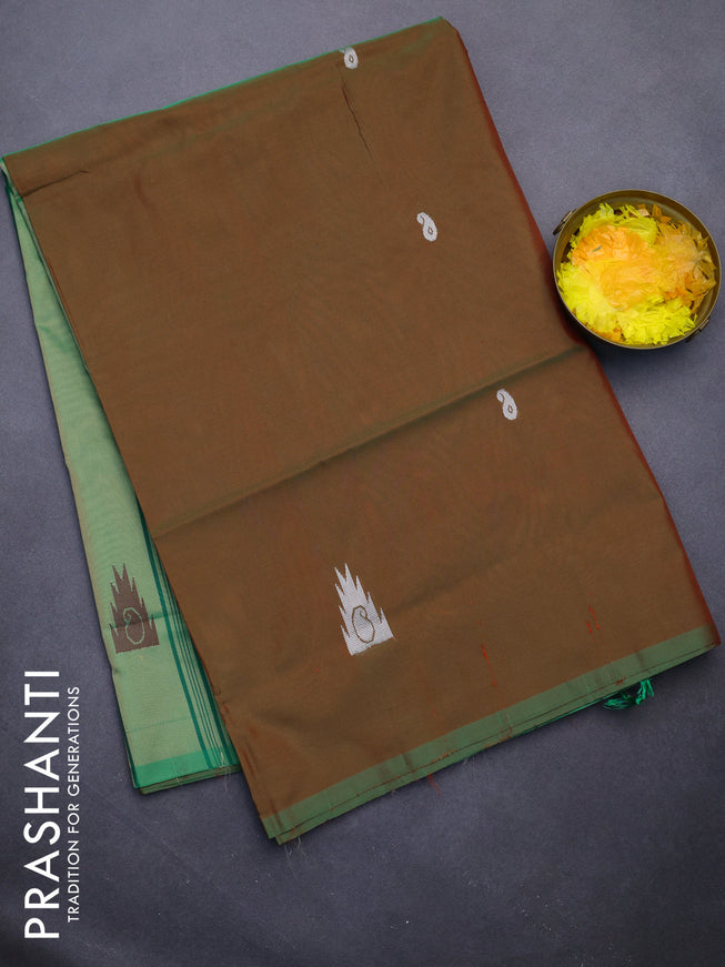 Banana pith saree dual shade of maroon and pastel green with thread woven buttas and piping border