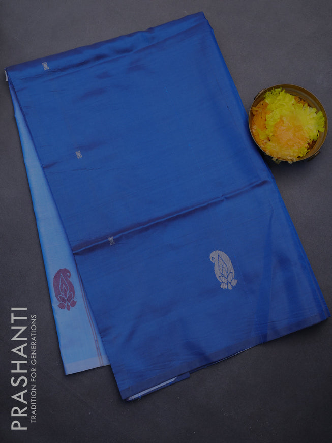 Banana pith saree peacock blue and light blue with thread woven buttas in borderless style