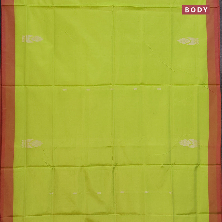 Banana pith saree fluorescent green and pink with thread woven buttas in borderless style