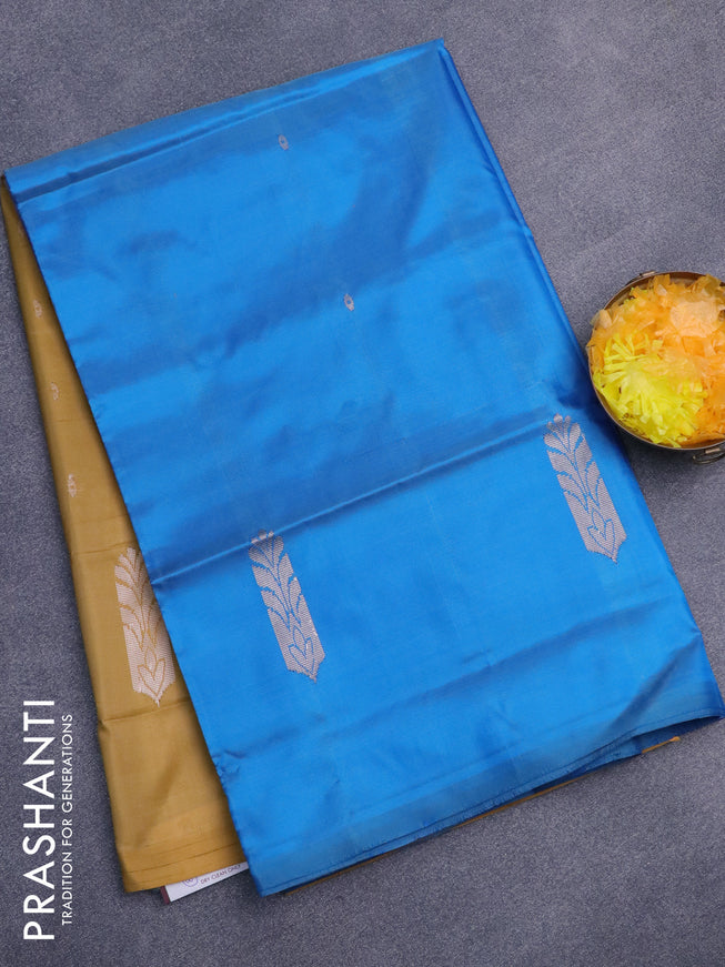 Banana pith saree cs blue and dark mustard with thread woven buttas in borderless style