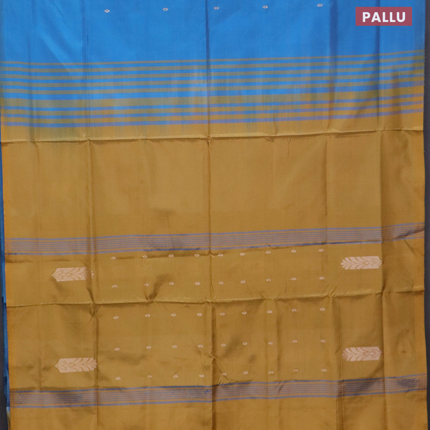 Banana pith saree cs blue and dark mustard with thread woven buttas in borderless style