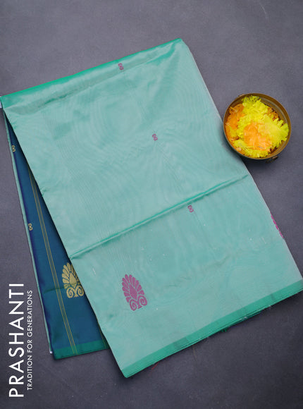 Banana pith saree green and dual shade of greenish blue with thread woven buttas in borderless style