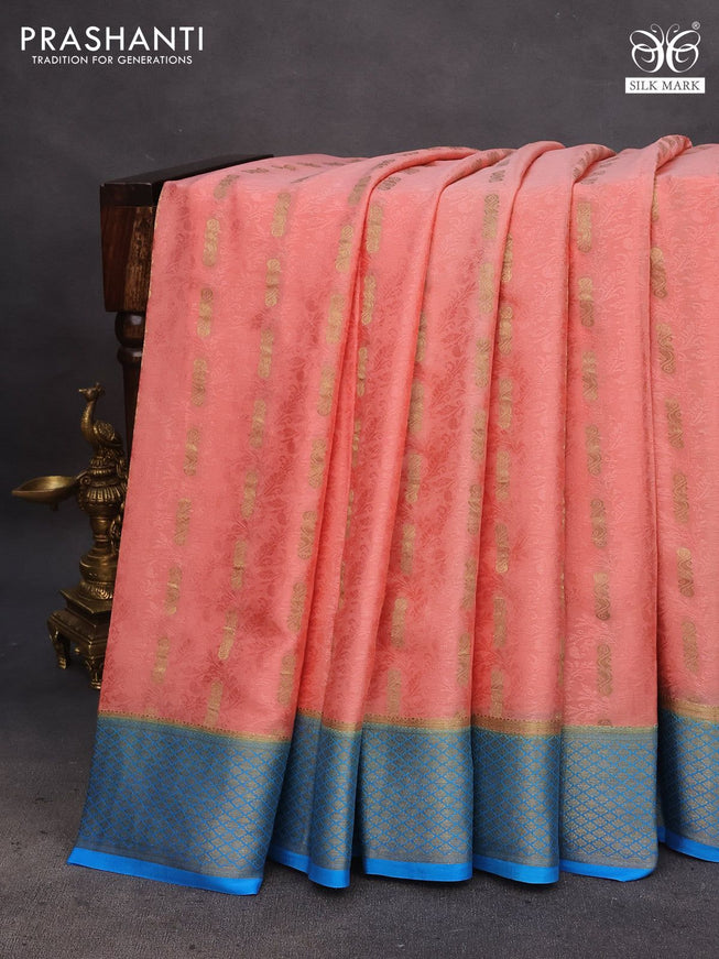 Pure mysore silk saree peach shade and blue with allover self mboss & zari buttas and zari woven border