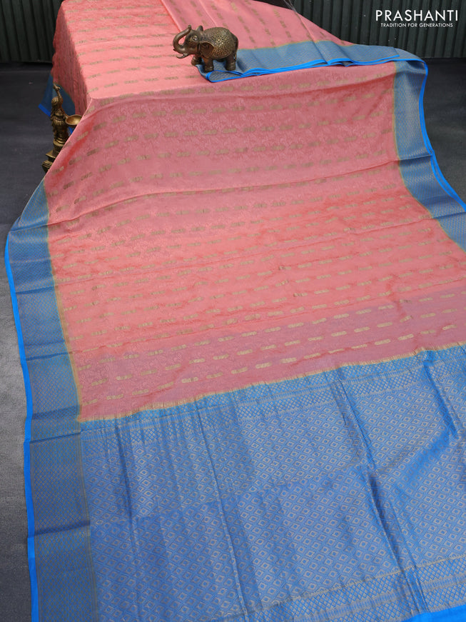 Pure mysore silk saree peach shade and blue with allover self mboss & zari buttas and zari woven border