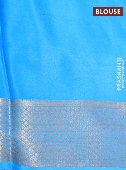 Pure mysore silk saree peach shade and blue with allover self mboss & zari buttas and zari woven border